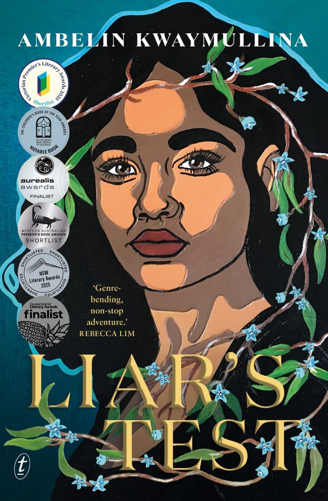 Cover art for 'Liar's Test' by Ambelin Kwaymullina. A young woman’s face is framed by blue flowers and green vines on a dark blue background. The title, Liars Test, is in large gold letters at the bottom of the cover, with the author’s name, Ambelin Kwaymullina, displayed in white text at the top. Six book award stickers are displayed on the left hand side of the cover.